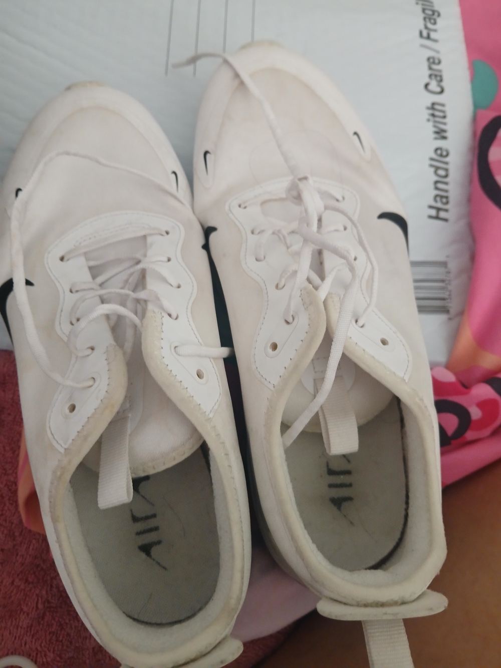 Nike Women's White Low-Top Lace-Up Sneakers with Black Swooshes